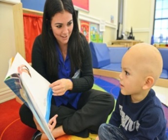 Teacher reading to student