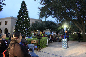 Dr. Lily F. Tercero, president of Texas Southmost College (TSC), pushes the lever to light the tree during TSC’s anual Tree Lighting Ceremony on Dec. 2, 2015 in front of Gorgas Hall.