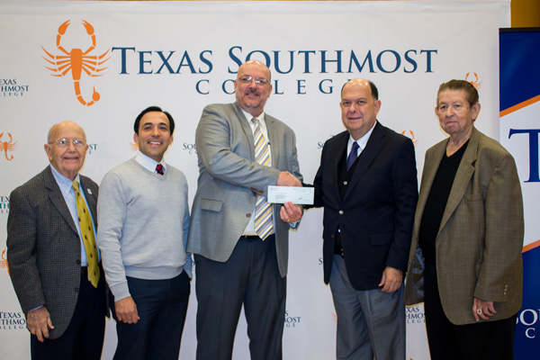 The Mexican Consulate presented an IME Becas grant to Texas Southmost College on Dec. 20, 2016 at the TSC Arts Center Gold Hall in Brownsville, Texas. From left, TSC Board of Trustees member Dr. Reynaldo García, TSC Board of Trustees Vice Chair Trey Mendez III, TSC Interim President Mike Shannon, Mexican Consul Juan Carlos Cué Vega and TSC Board of Trustees member Ramón Hinojosa Champion.